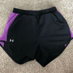 Black and purple athletic shorts with pockets